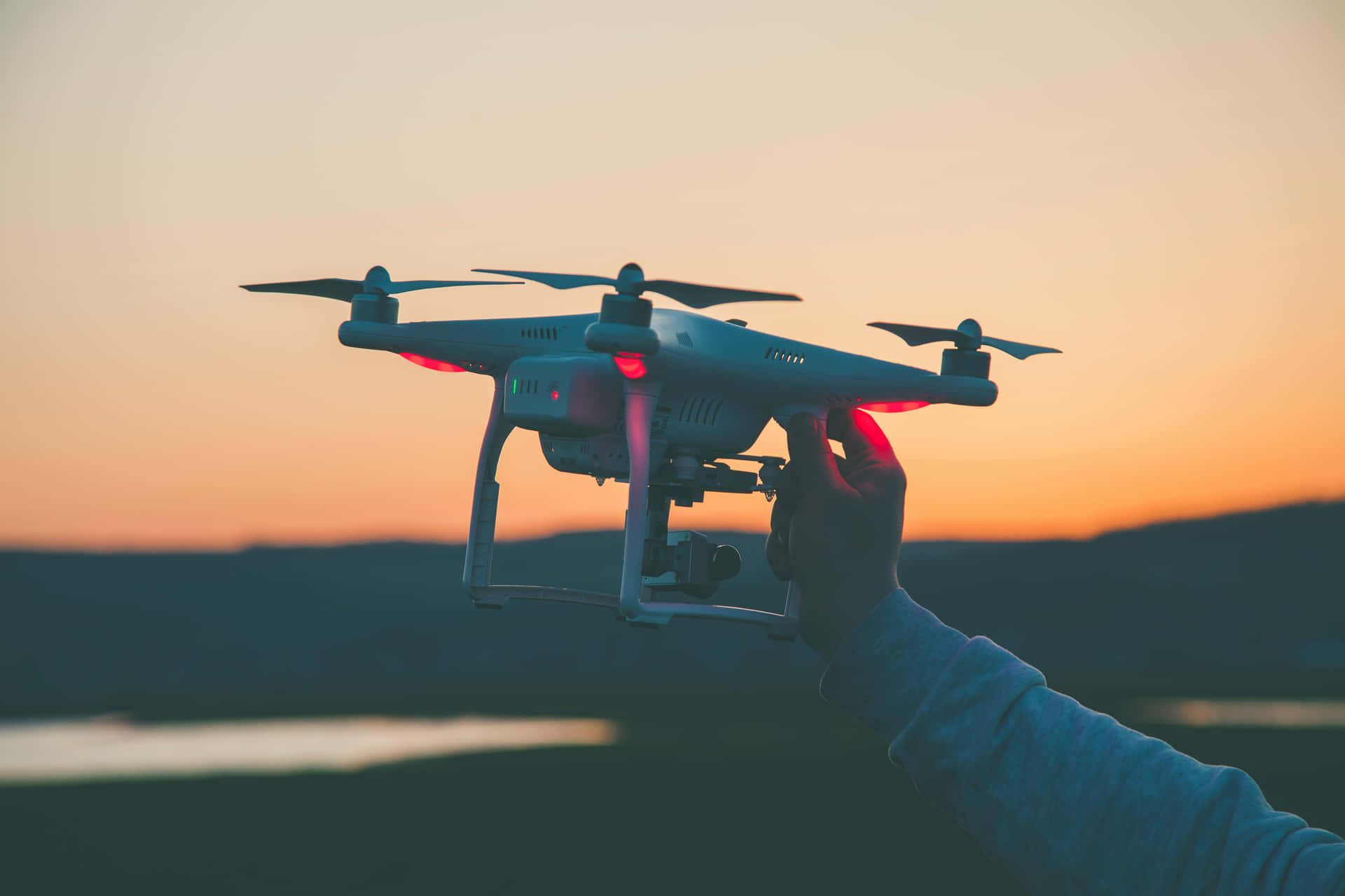 Drone Readyfor Takeoffat Sunset Background