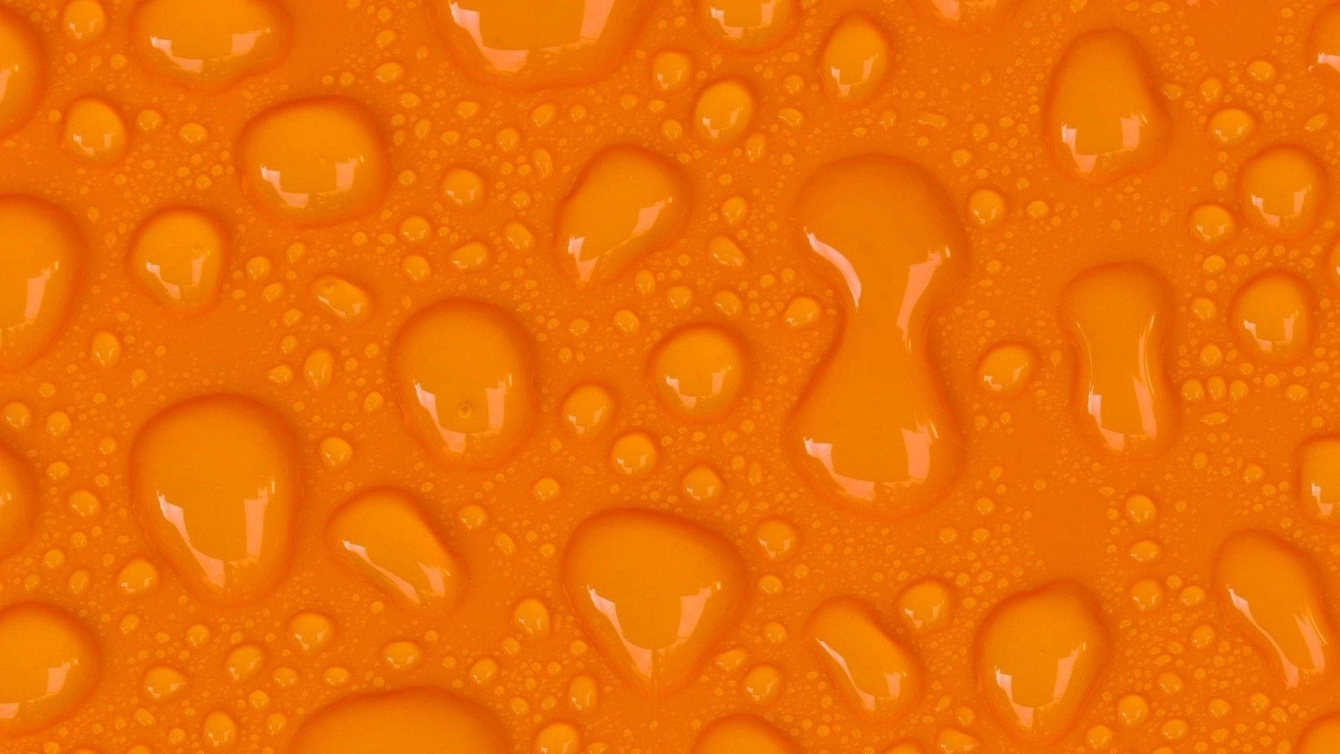 Droplets On An Orange Background Background