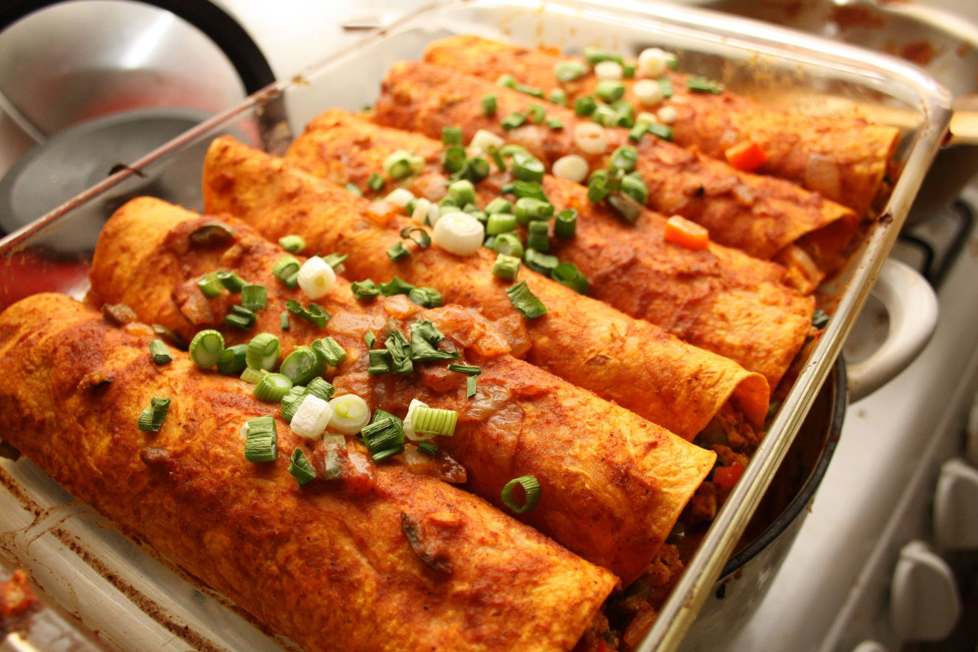 Dry Enchiladas Tray With Spring Onions Background