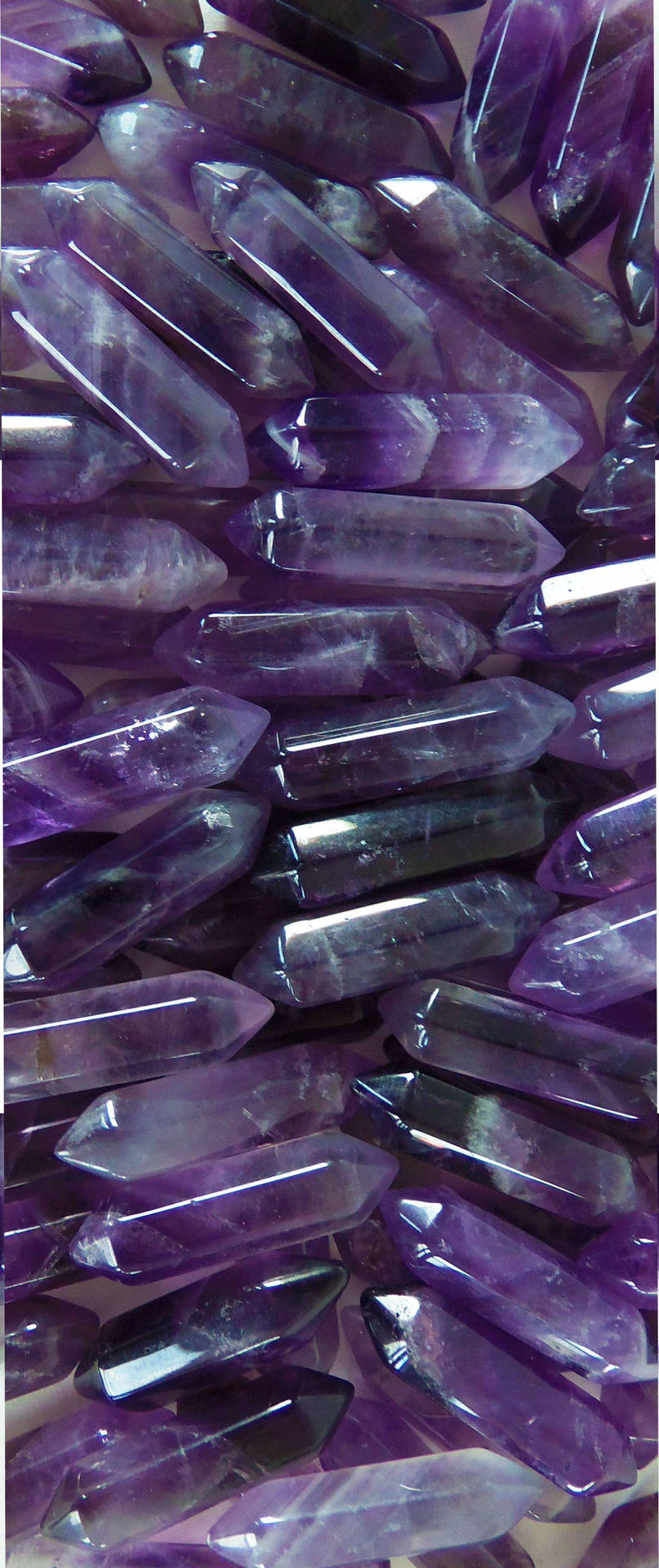 Dual Pointed Amethyst Rods Background