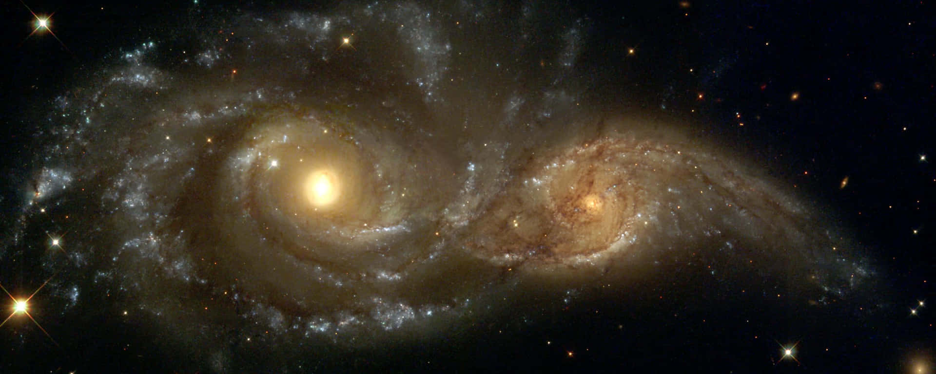 Dual Screen Space Two Spiral Galaxies Background
