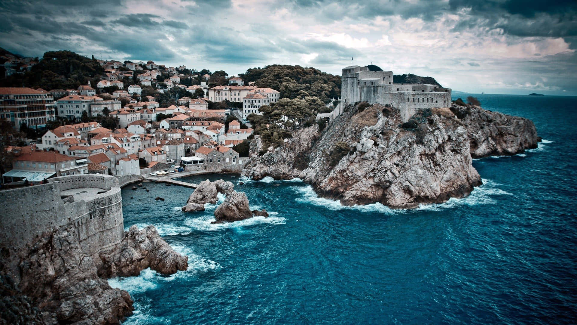Dubrovnik On Top Of Jagged Cliffs Background