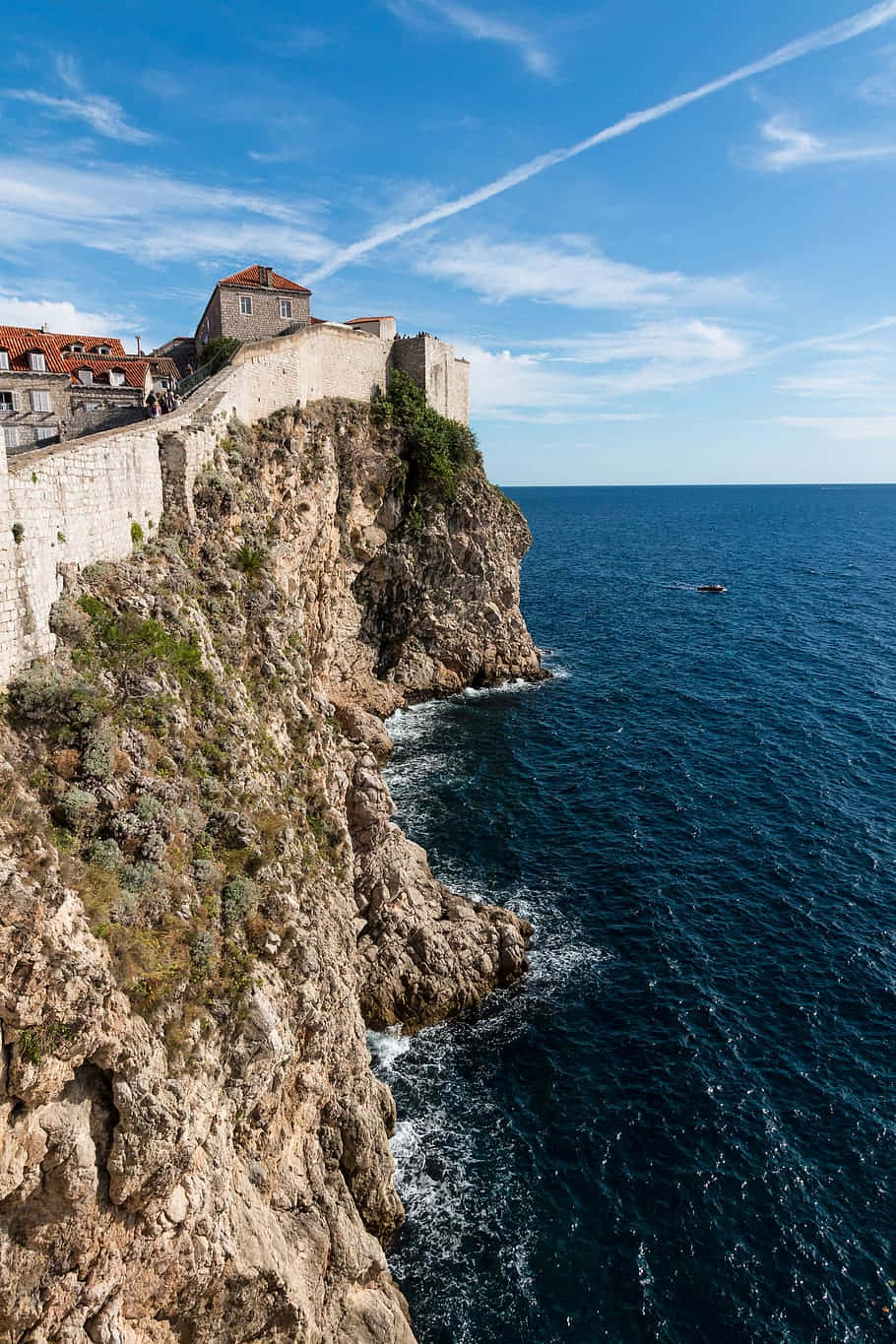 Dubrovnik Rough And Jagged Cliff Background