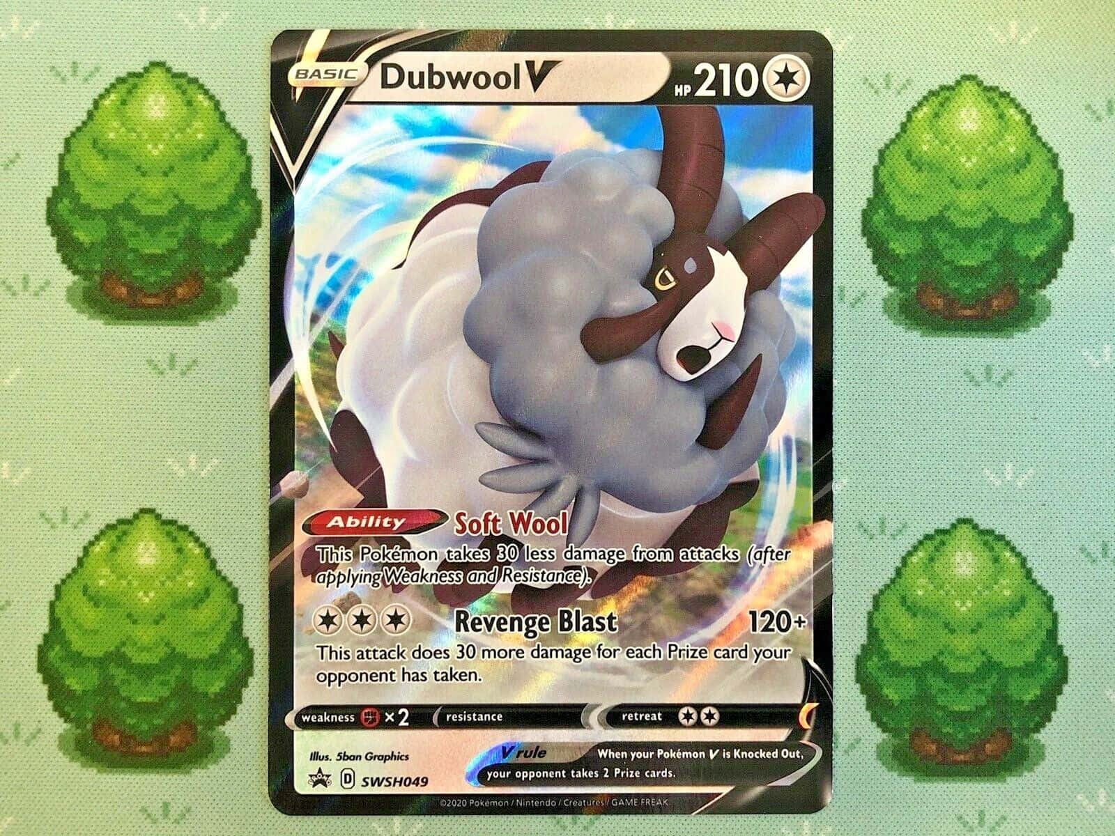 Dubwool Pokemon Card On Grass