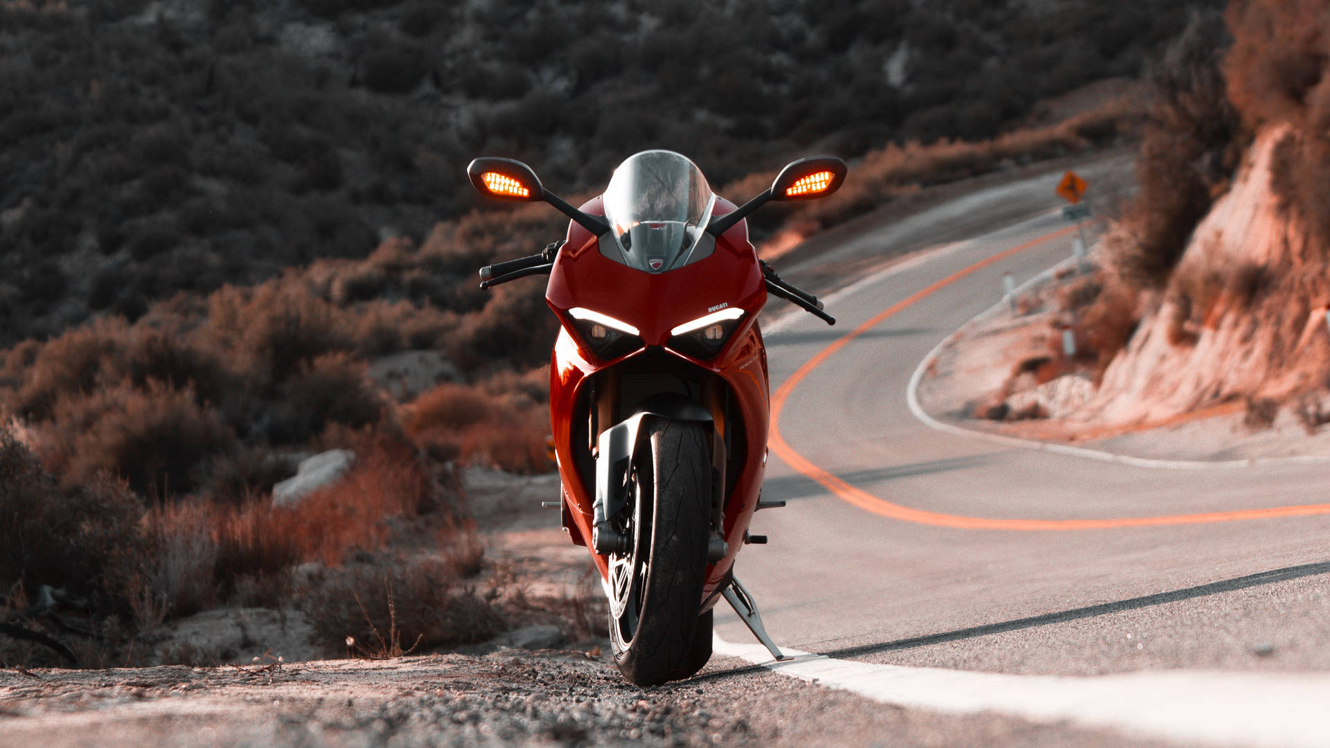 Ducati Panigale Red Bike On Highway Background