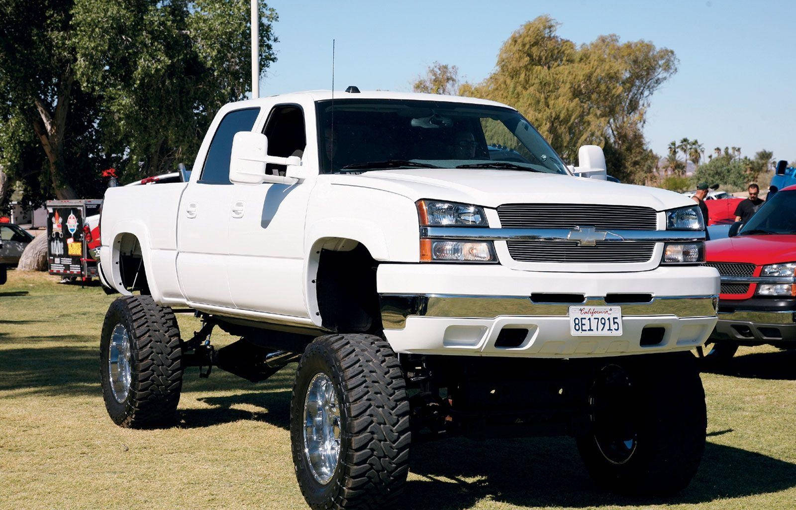 Duramax With Big Tires And High Suspension Background