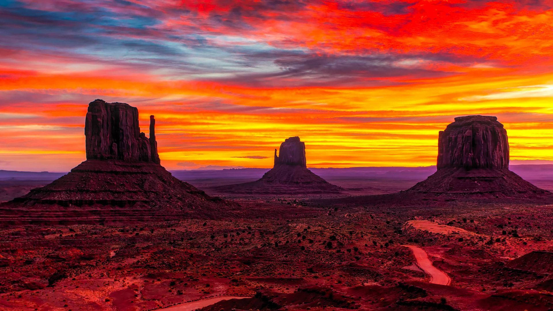 Dusk At Monument Valley Background