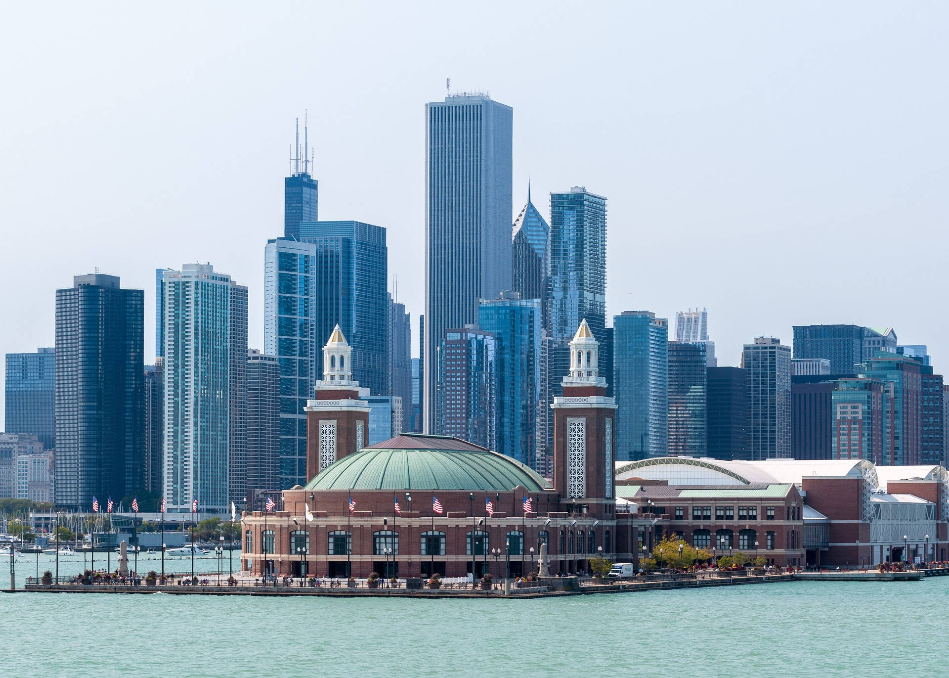 Dusk At Navy Pier - Vibrant City Lights Reflecting Off Lake Michigan