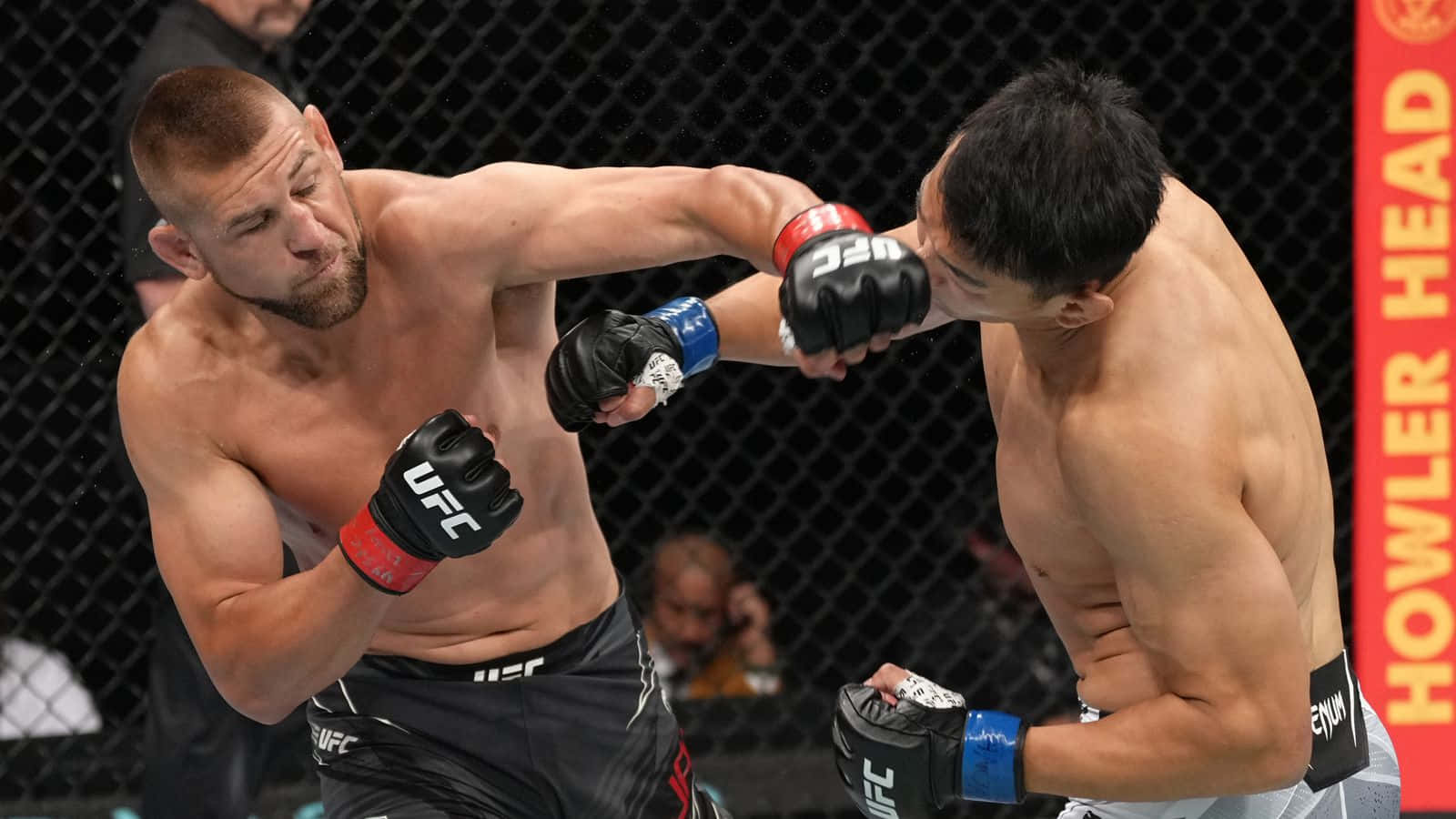 Dustin Jacoby In Action Against Da Un Jung In A Thrilling Mma Match Background