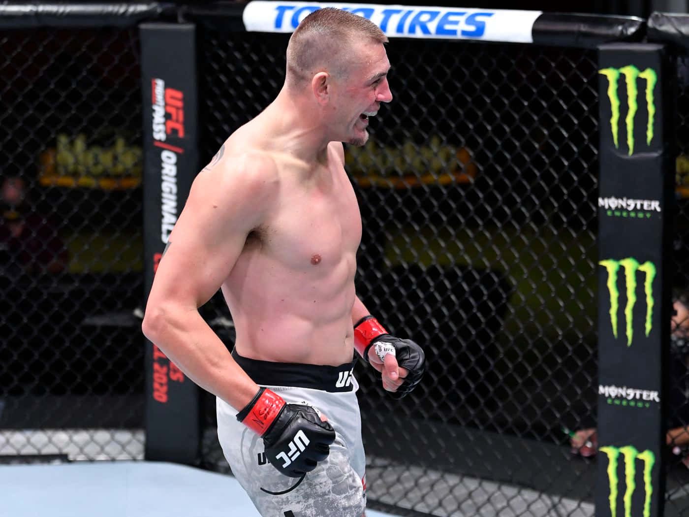 Dustin Jacoby Smiling Inside Ring Background