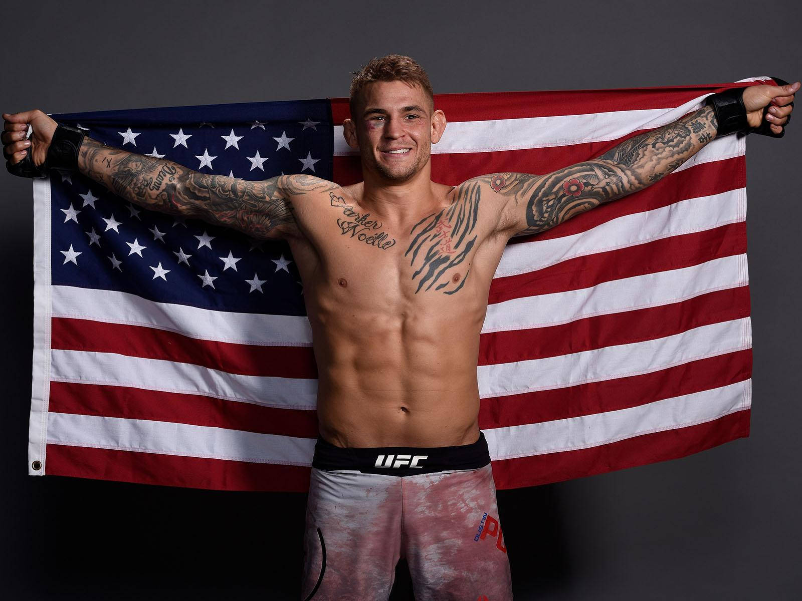 Dustin Poirier Holding American Flag