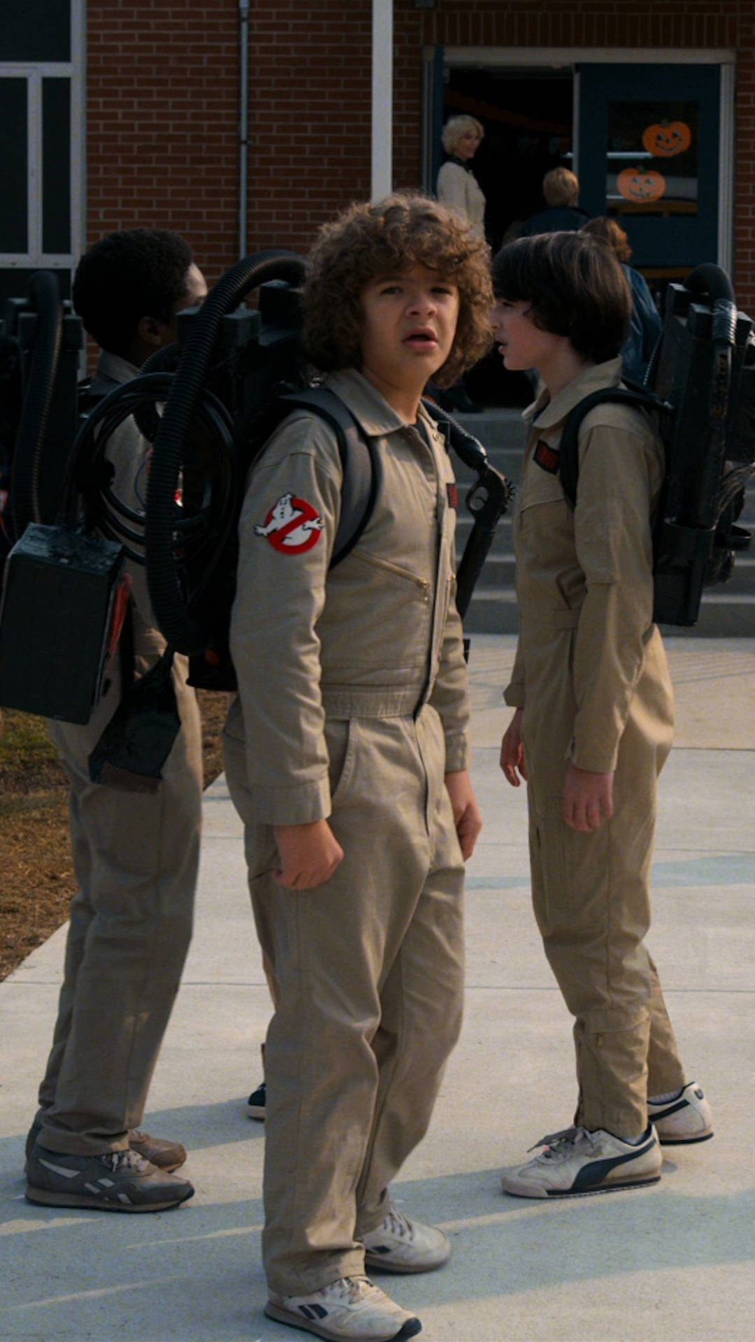 Dustin Stranger Things In Ghostbusters Costume Background