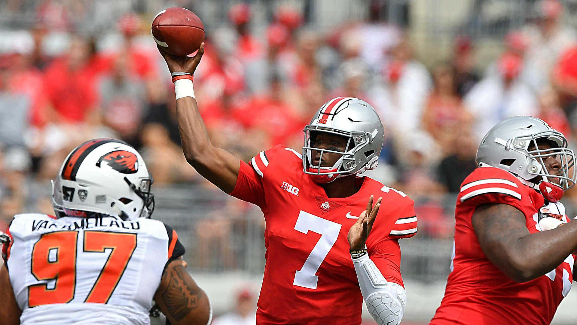 Dwayne Haskins Catching Football Background