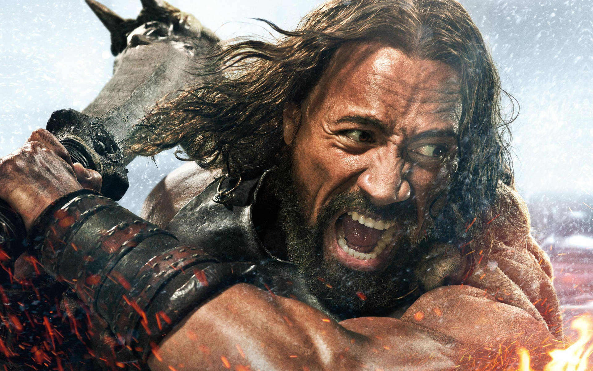 Dwayne Johnson In Character As Hercules, Displaying His Formidable Physique And Intense Expression. Background