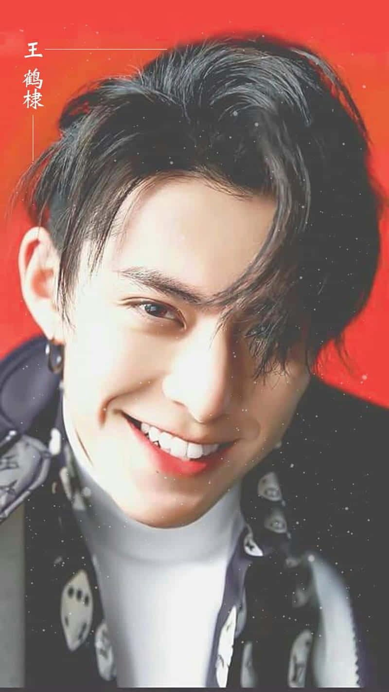 Dylan Wang In A Red Background Background