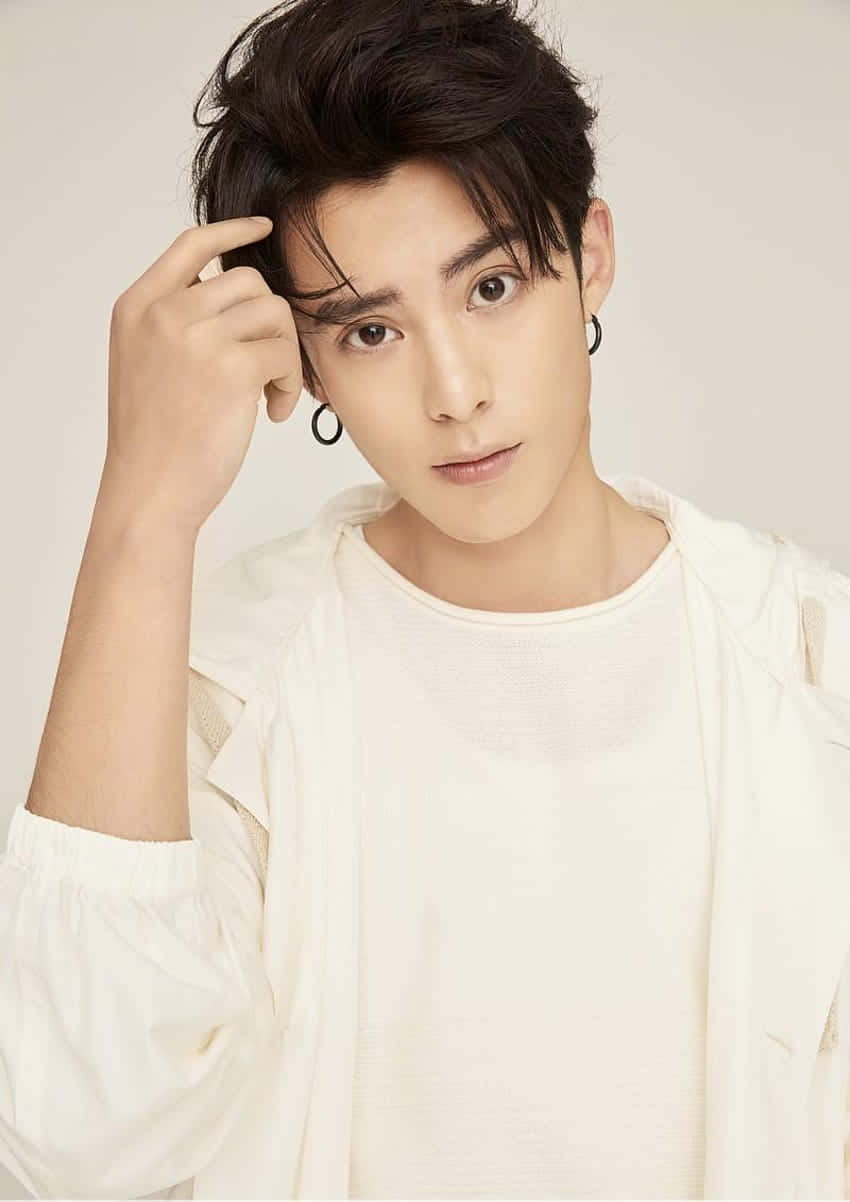 Dylan Wang In White Shirt Background