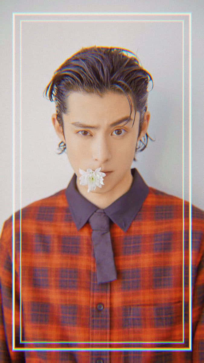 Dylan Wang Wearing Checkered Polo Background