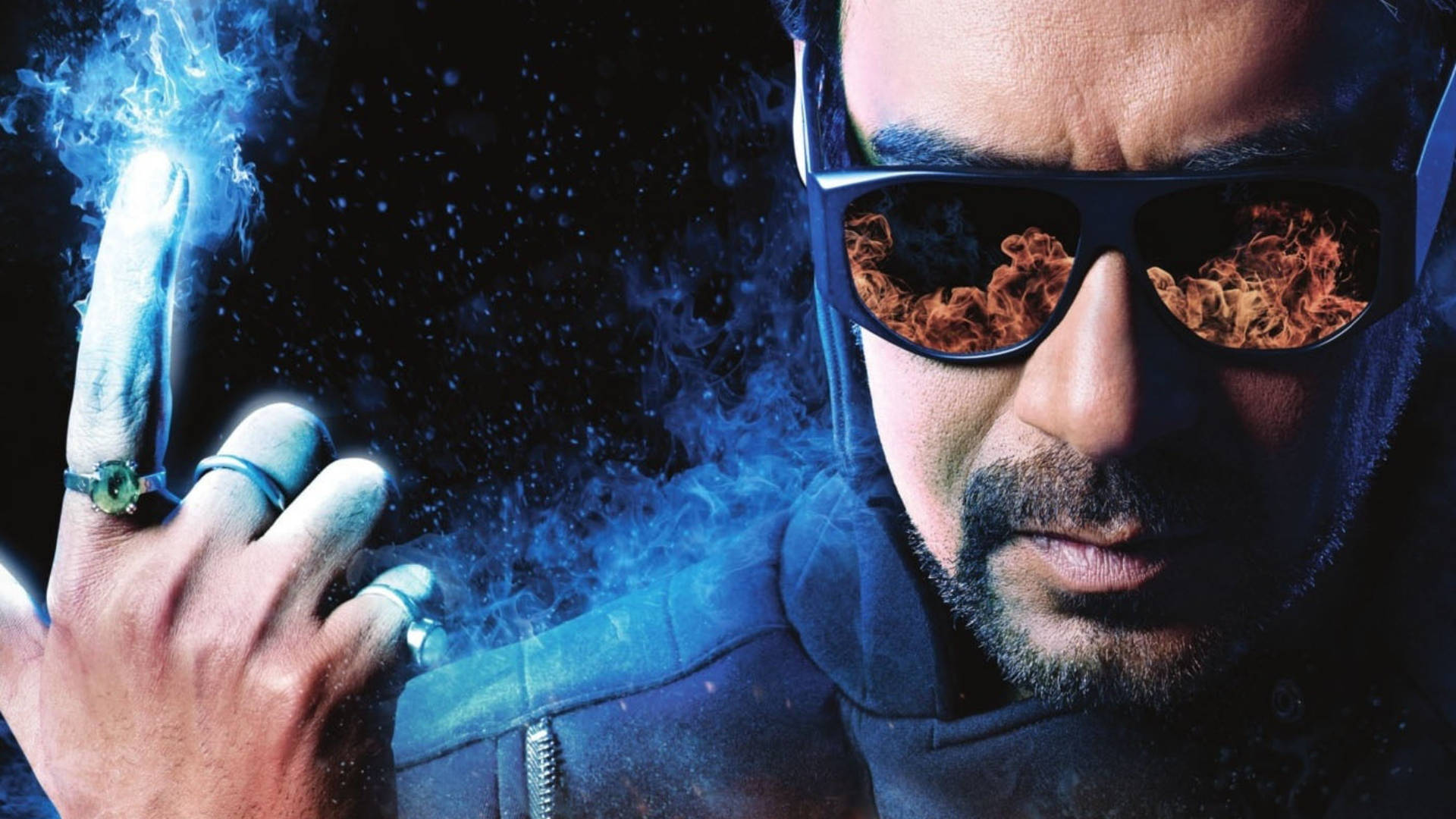 Dynamic Ajay Devgn In Action Jackson Movie Poster Background