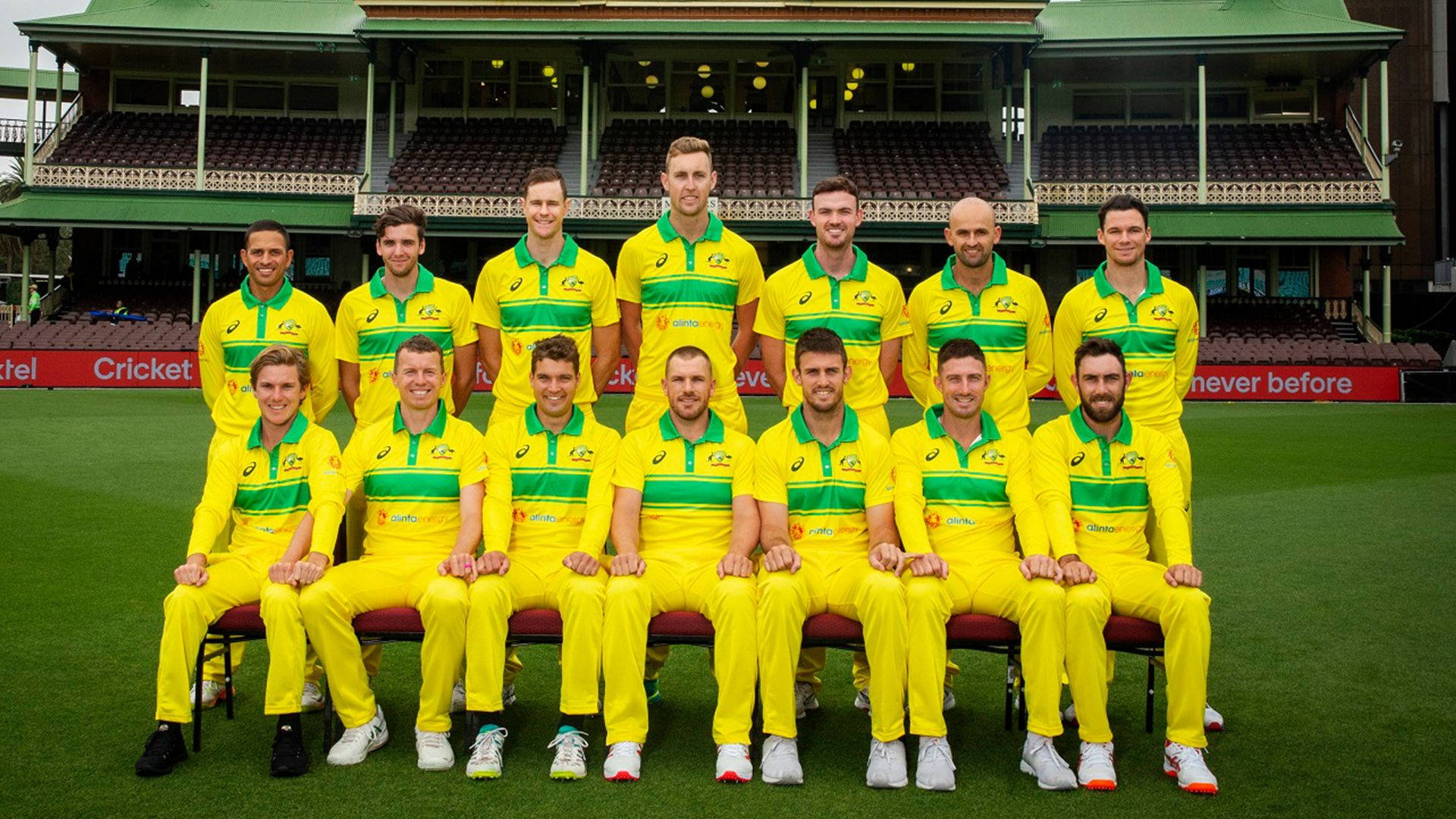 Dynamic Australia Cricket Team In Action Background