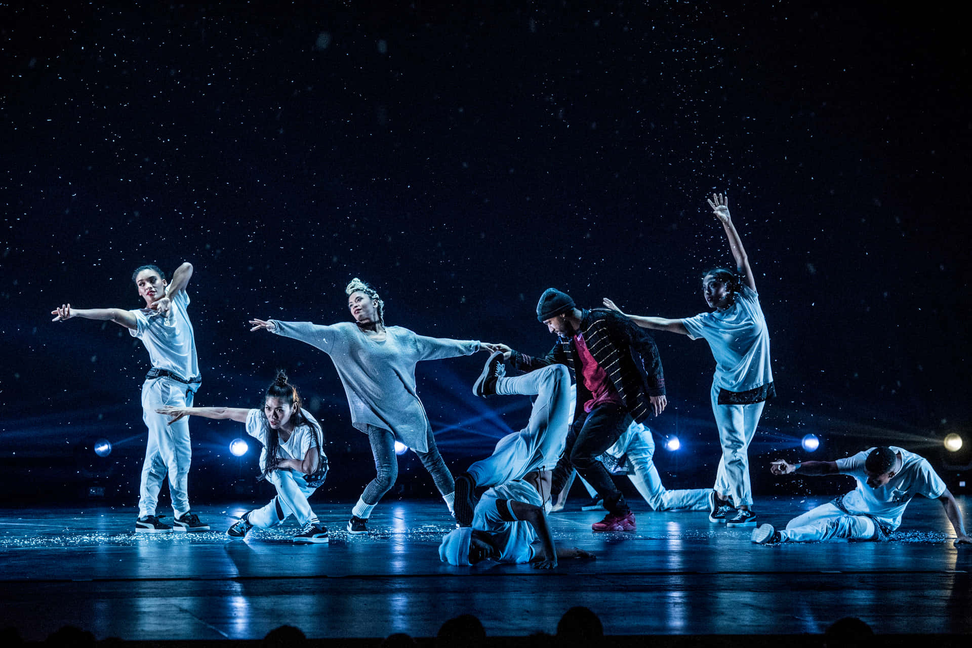Dynamic_ Hip Hop_ Dance_ Performance_ Under_ Spotlights Background