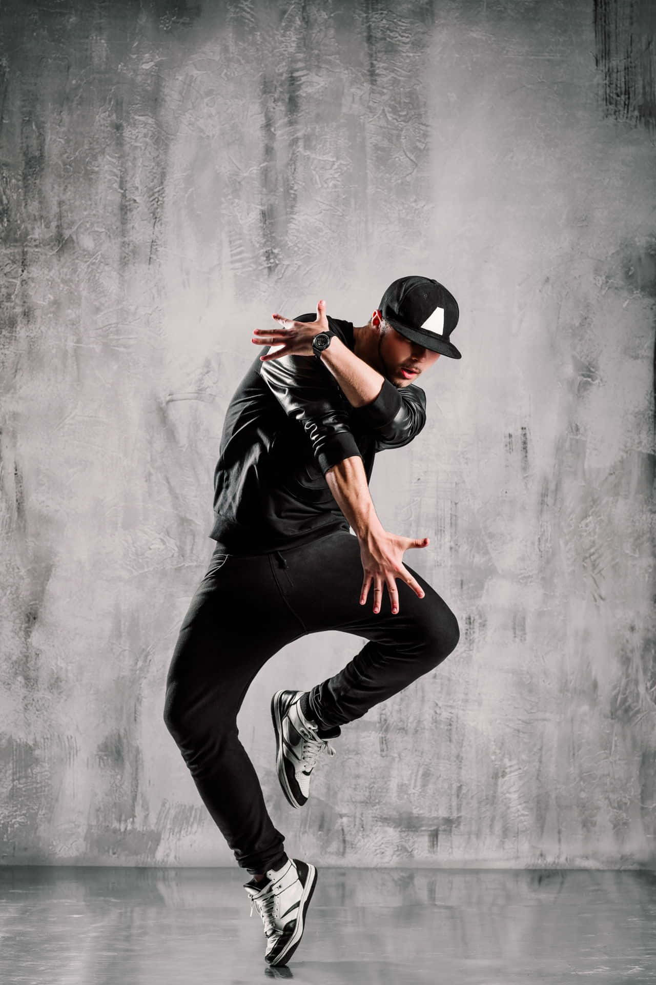 Dynamic Hip Hop Dancerin Action.jpg Background