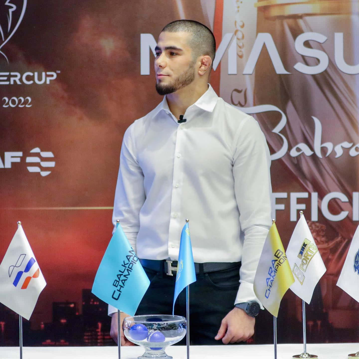 Dynamic Mixed Martial Artist Muhammad Mokaev Attending Press Conference Background