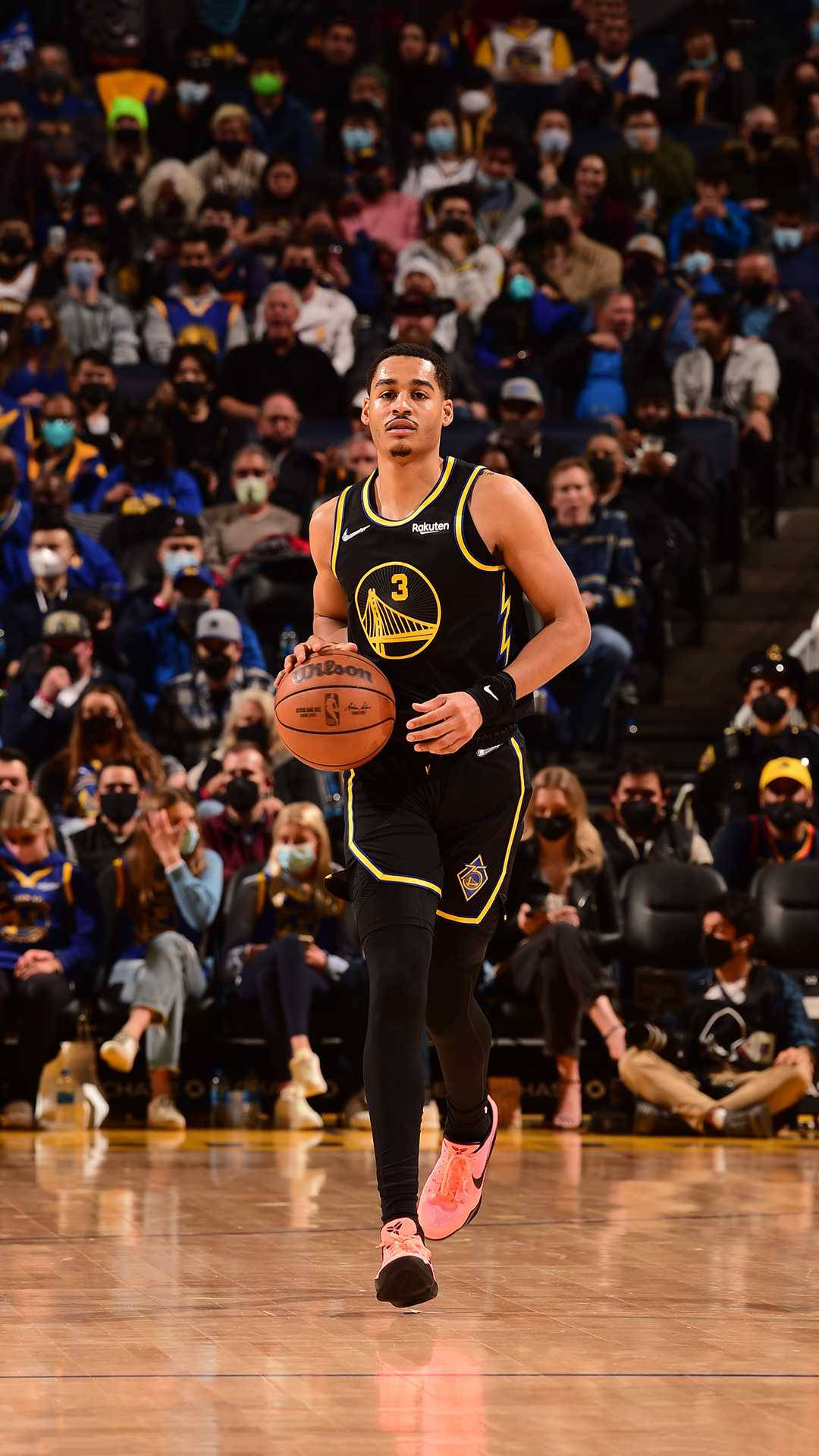 Dynamic Shot Of Nba Star, Jordan Poole In Action Background
