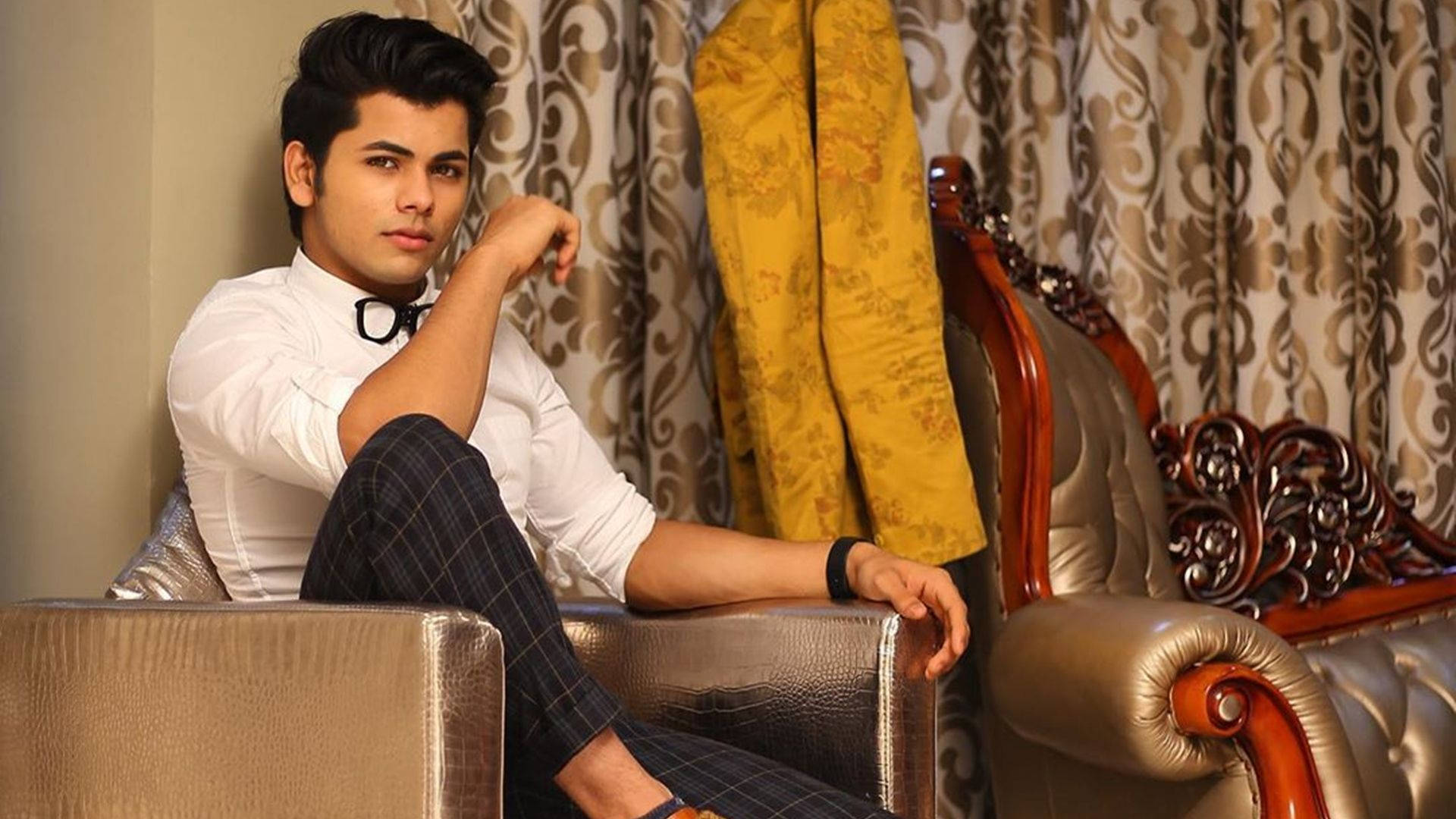 Dynamic Siddharth Nigam Captured In A Casual Moment Background