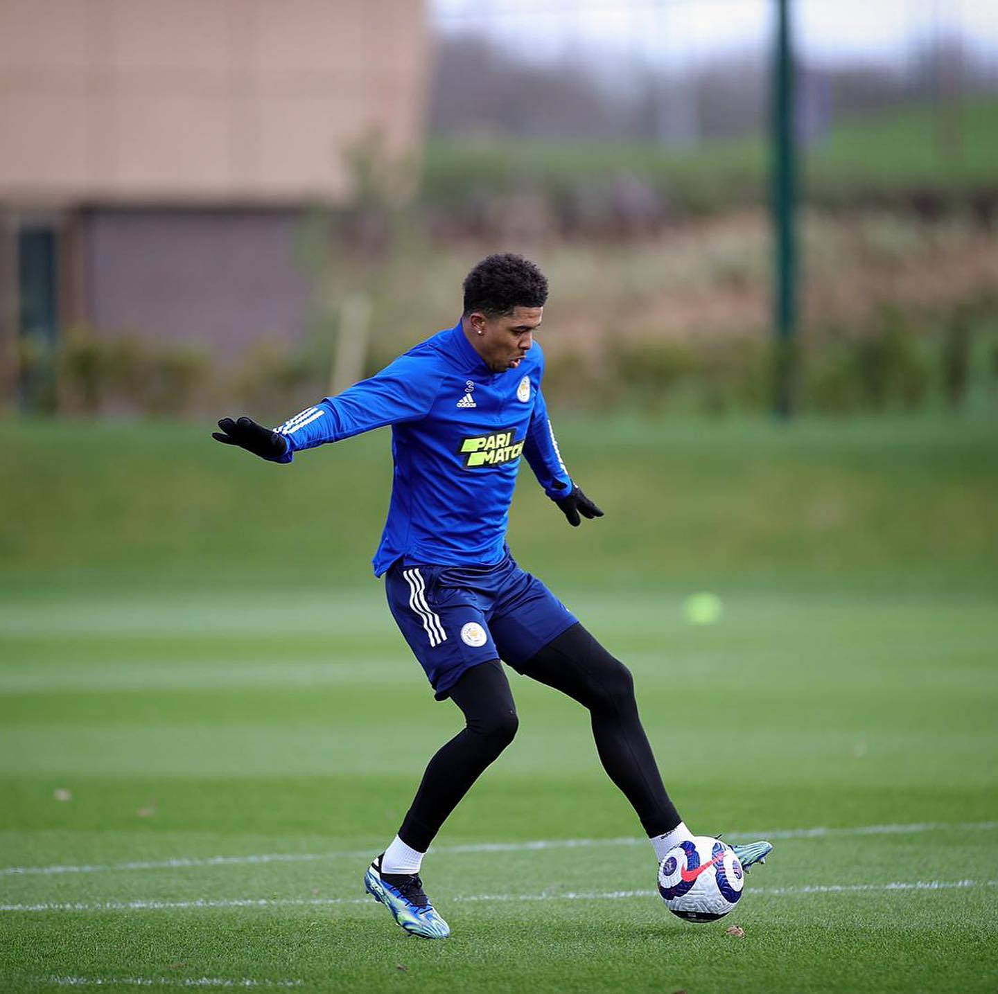 Dynamic Wesley Fofana Mid-kick On Football Field