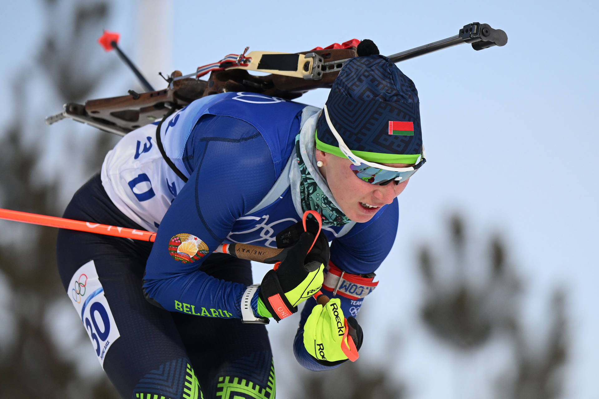 Dzinara Alimbekava Biathlon Skiing At Beijing Winter Olympics Background