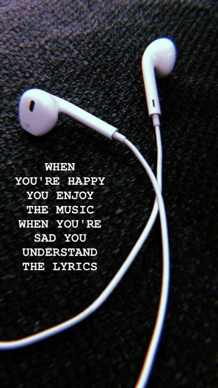 Earphones With The Quote When You're Happy The Music Is When You Understand The Lyrics