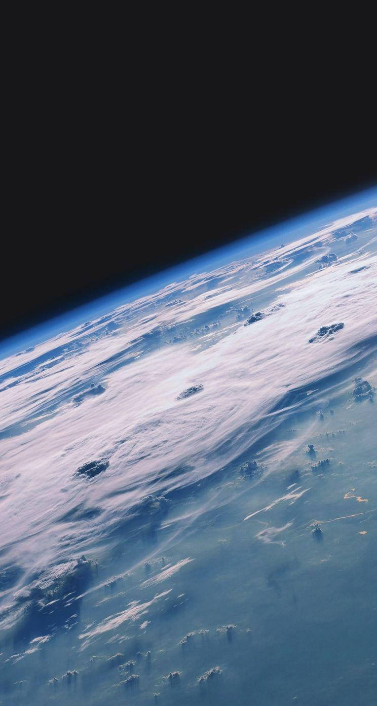 Earth Surface Over Dark Sky Ios 7 Background