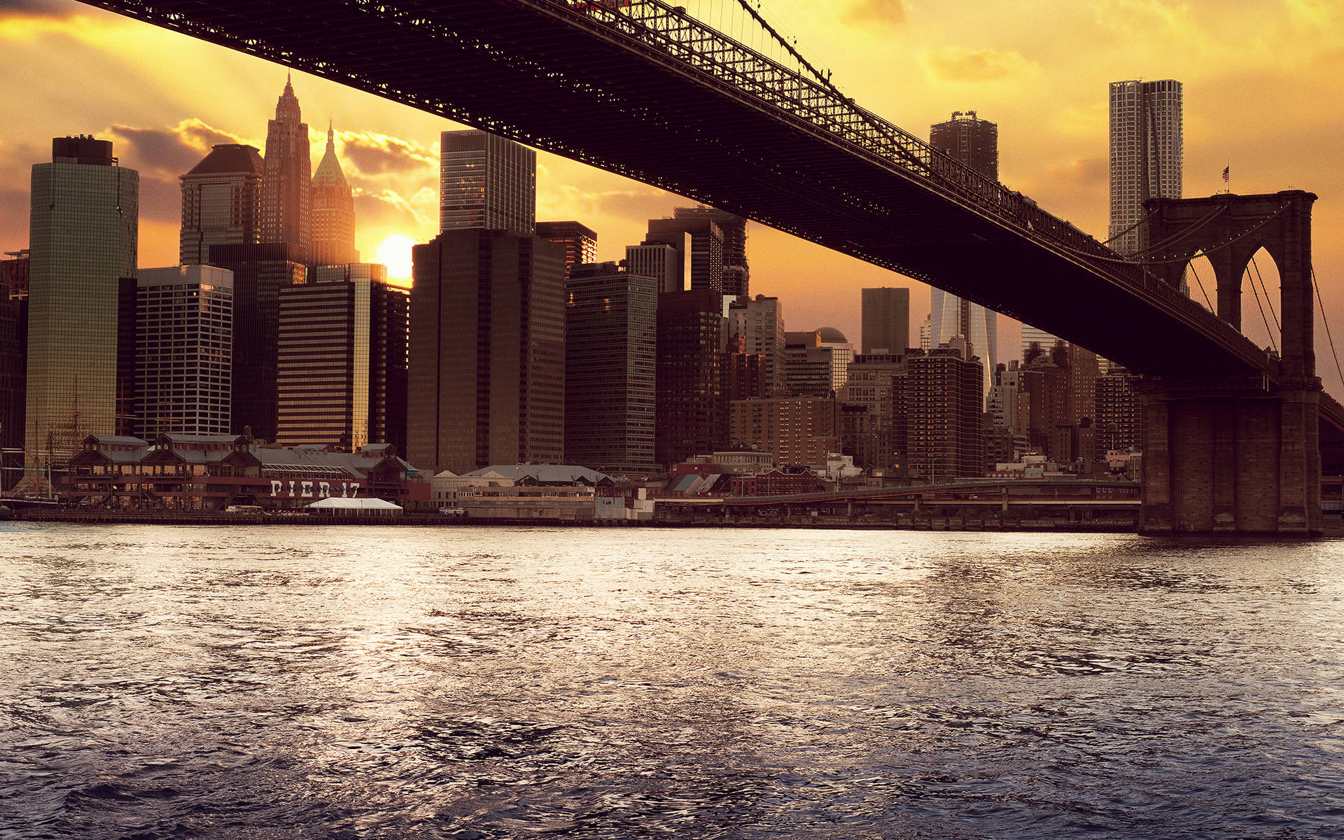 East River And Brooklyn Bridge At Sunset Background