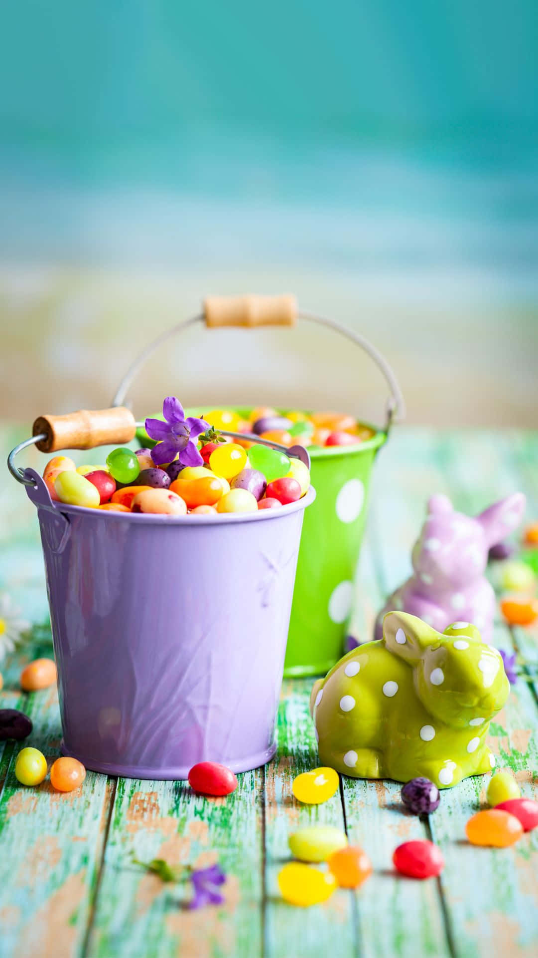 Easter Baskets With Candy On A Wooden Table Background