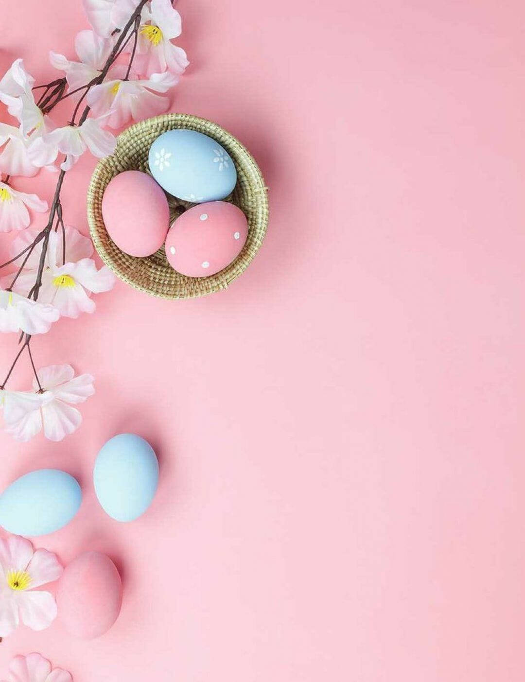 Easter Eggs On Pink Background With Cherry Blossoms