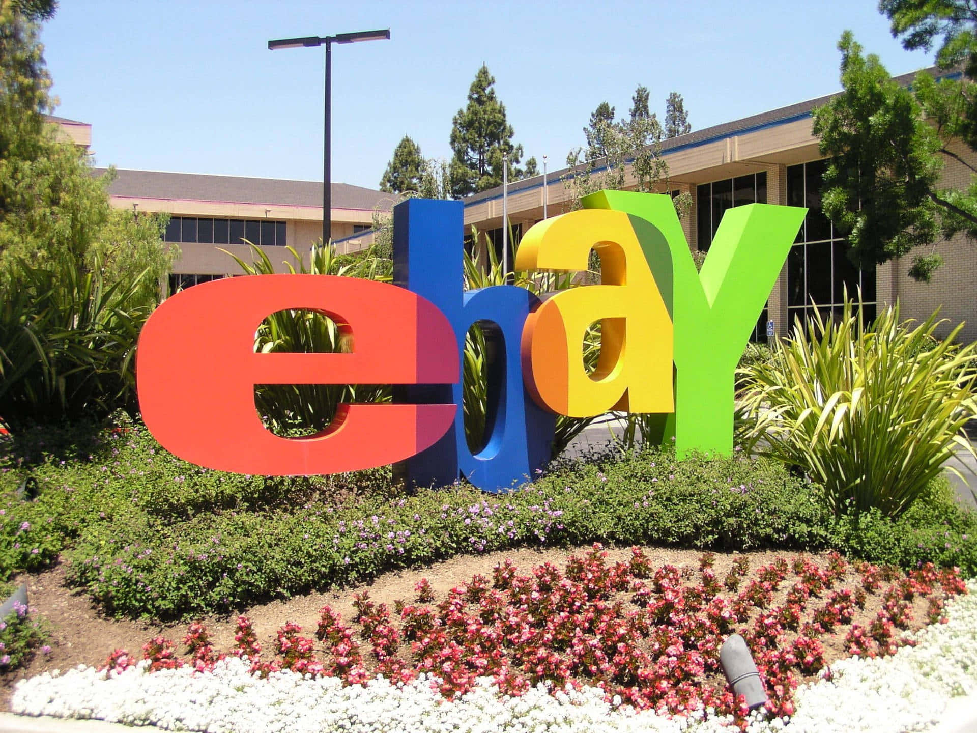 Ebay Uk Logo With Shrubs Background