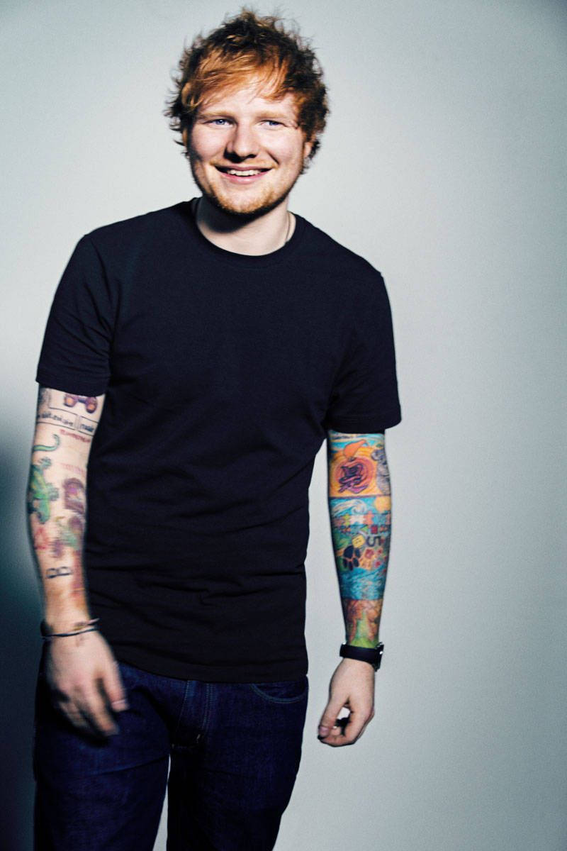 Ed Sheeran Beaming With Joy Background