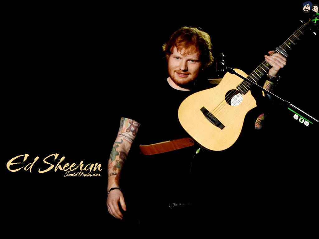 Ed Sheeran Performing In Black Background