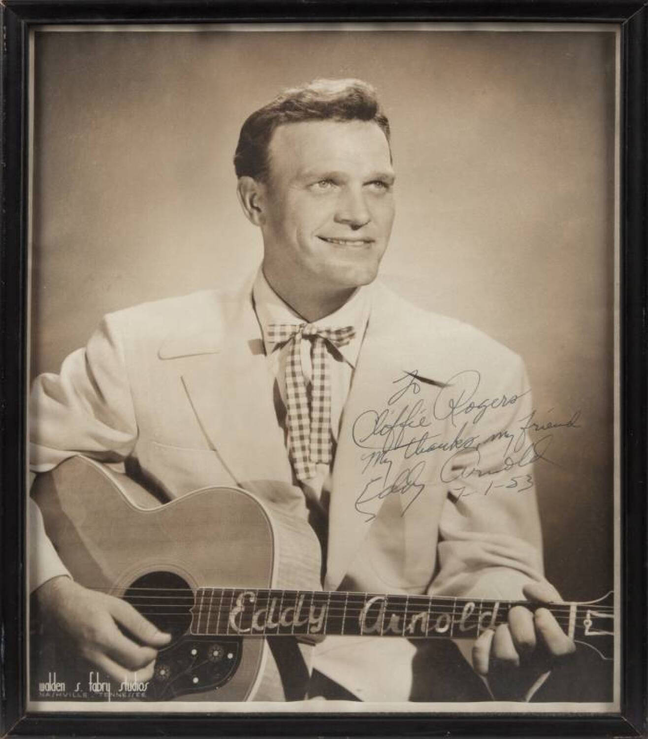 Eddy Arnold Playing Guitar With Signature Background