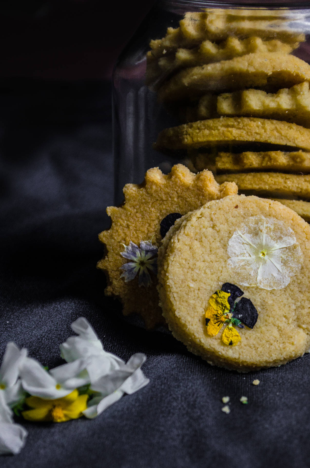 Edible Flowers And Sugar Cookie Pastries Background