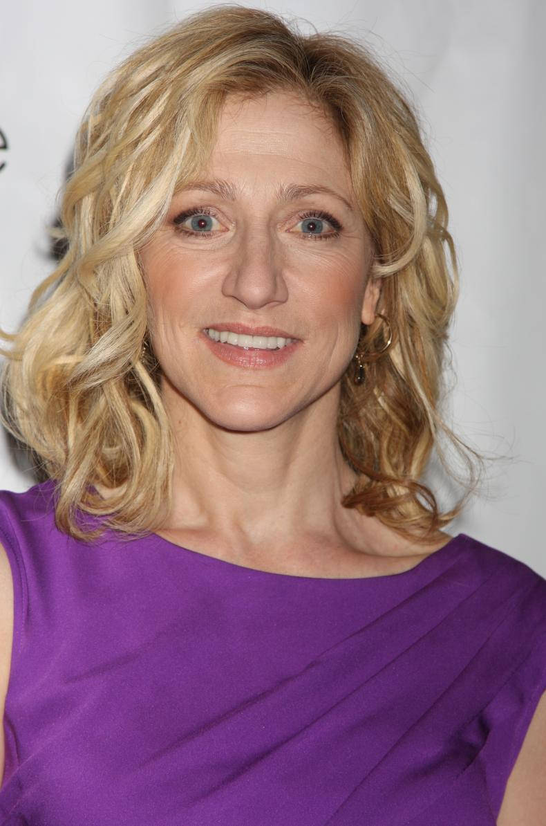 Edie Falco At An Event Background