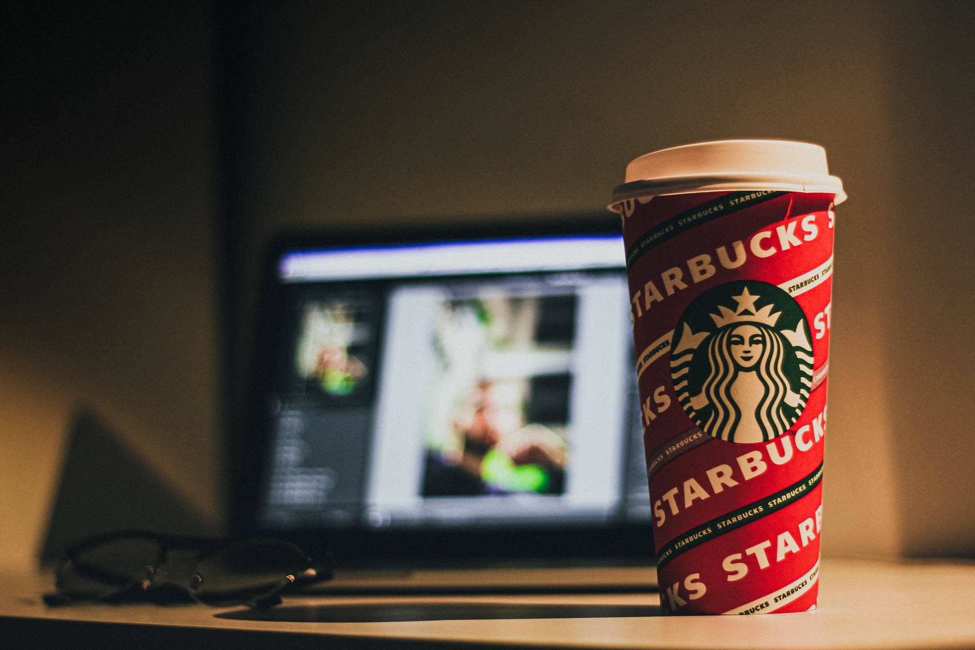 Editing Software And Starbucks Cup Background