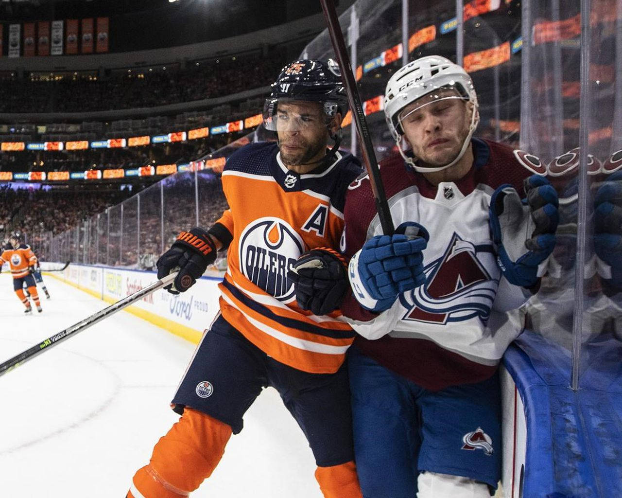 Edmonton Oilers Darnell Nurse And Colorado Avalanche Mikko Rantanen Background