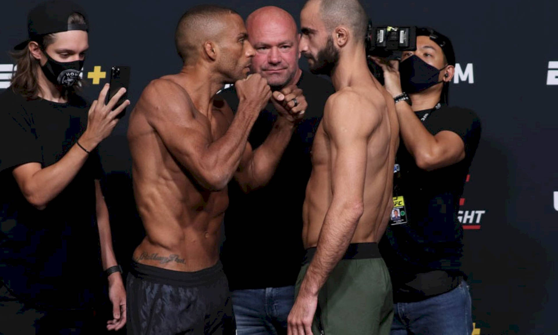 Edson Barboza And Giga Chikadze In Intense Mma Duel. Background