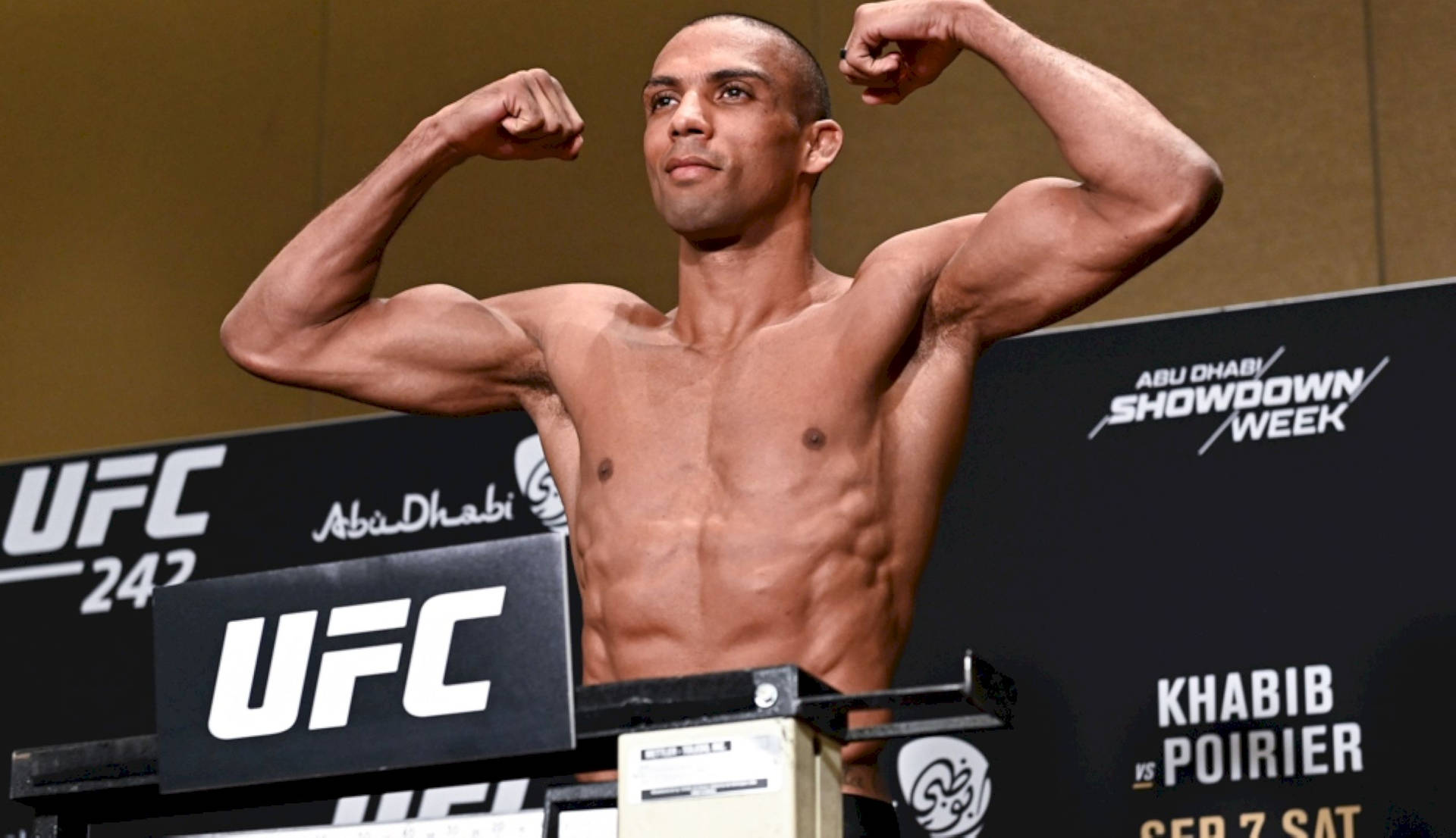 Edson Barboza Flexing His Muscles Background