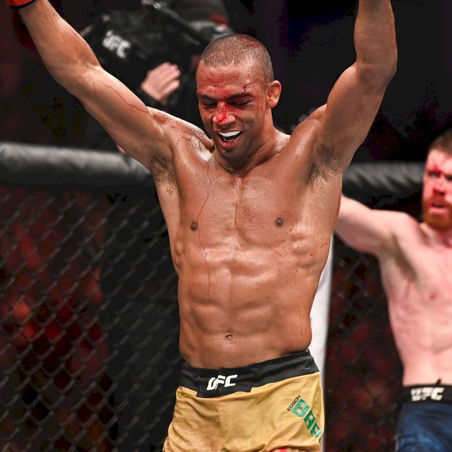 Edson Barboza Smiling With Bloody Nose Background