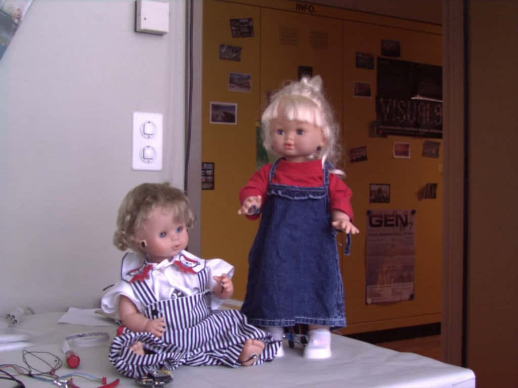 Educational Dollsin Classroom Setting Background