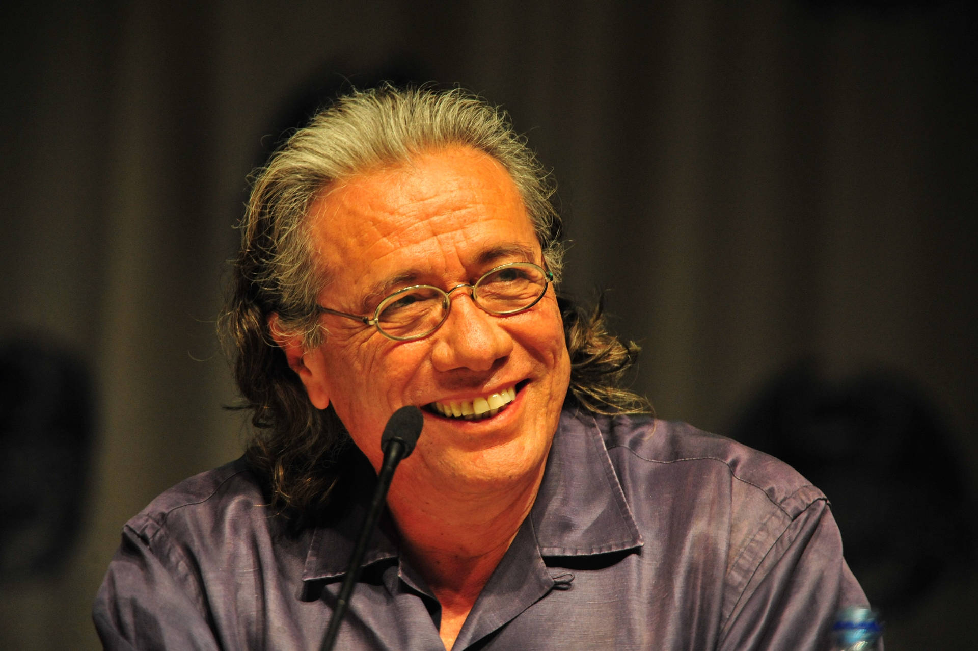 Edward James Olmos Delivering A Speech Background