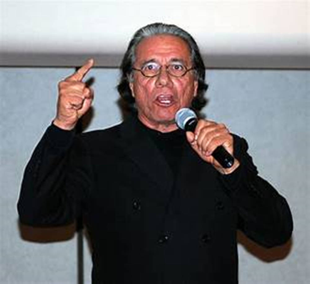 Edward James Olmos Holding Microphone Background