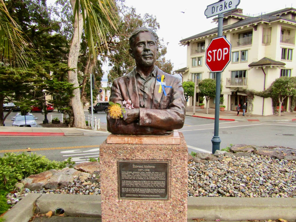 Edward Ricketts Statue In Cannery Row Background